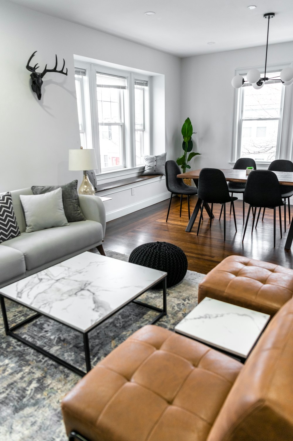 white and black table near white couch