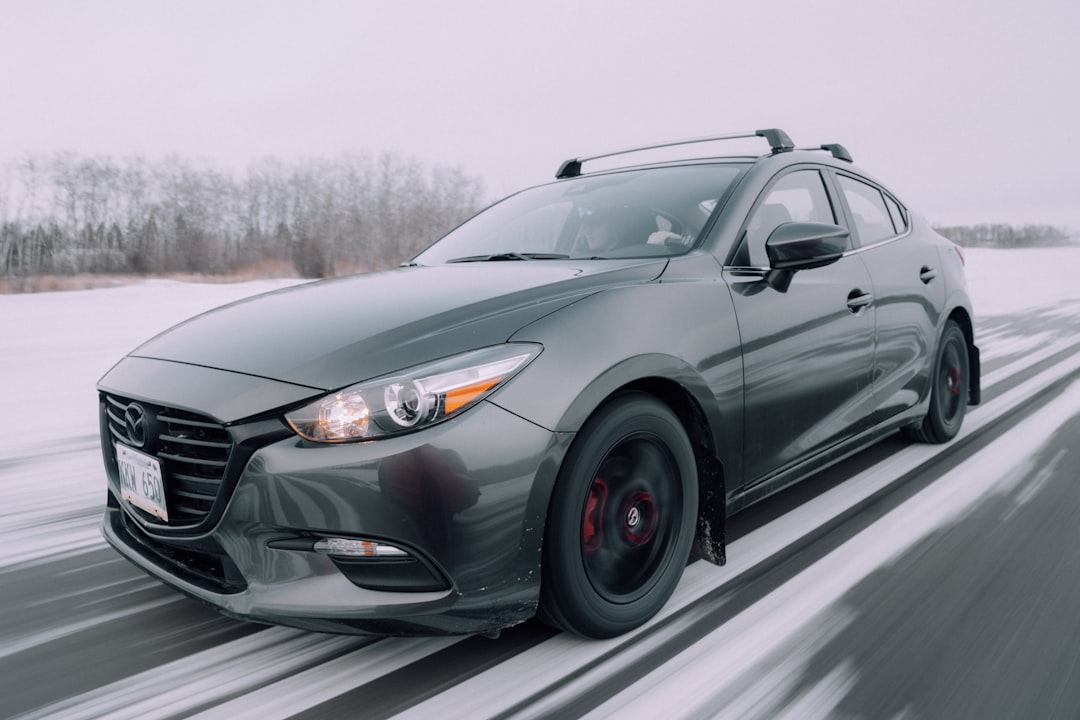 gray mercedes benz coupe on road