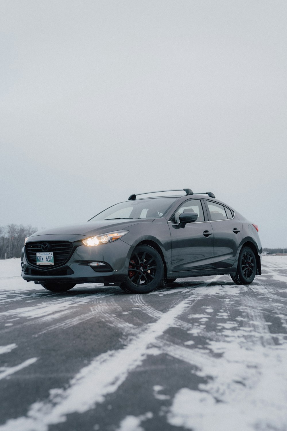 black bmw x 6 on snow covered ground