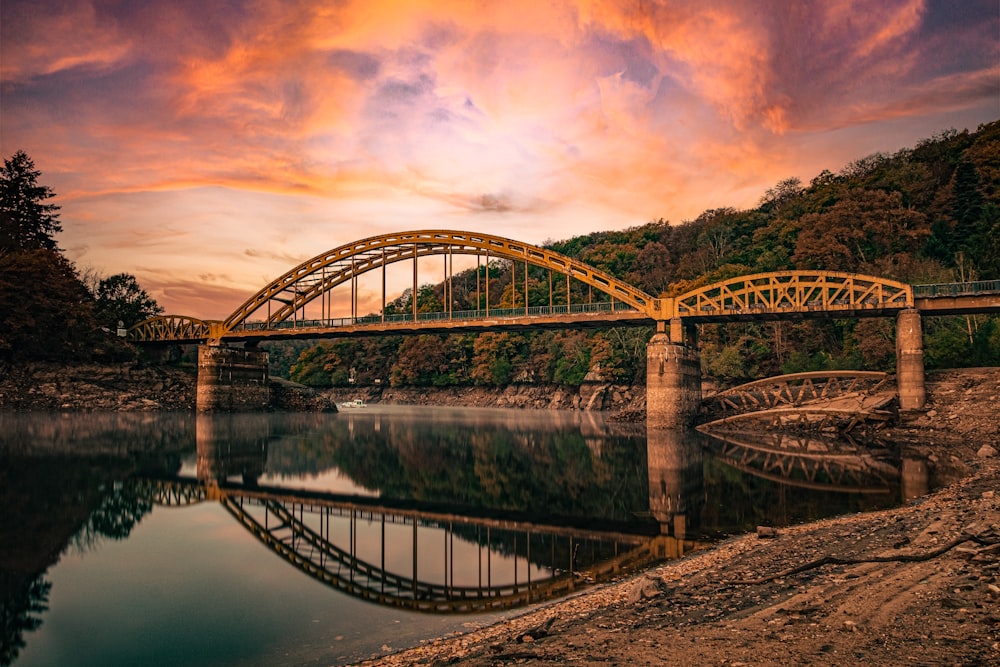 gray metal bridge over river