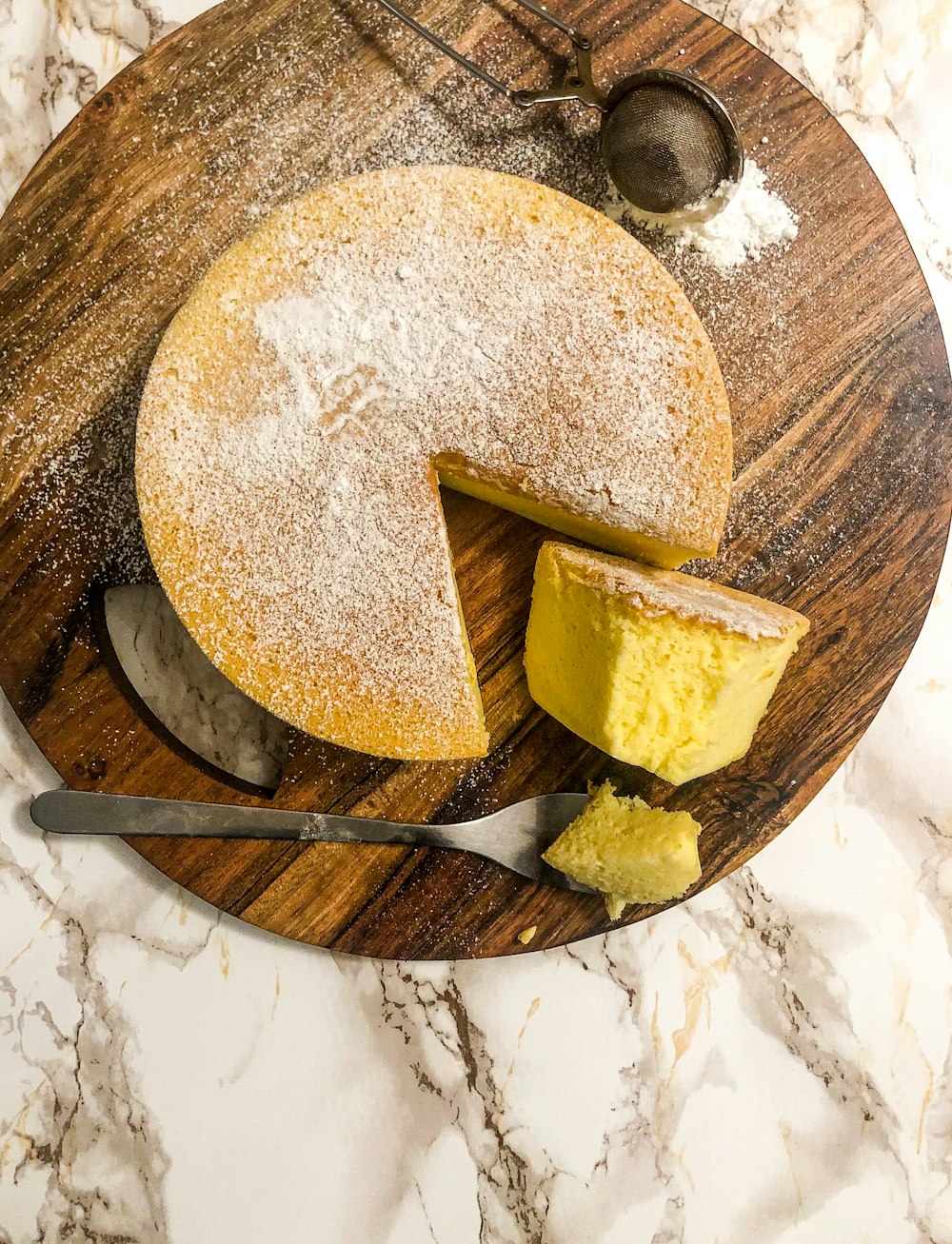 sliced bread on brown wooden round plate