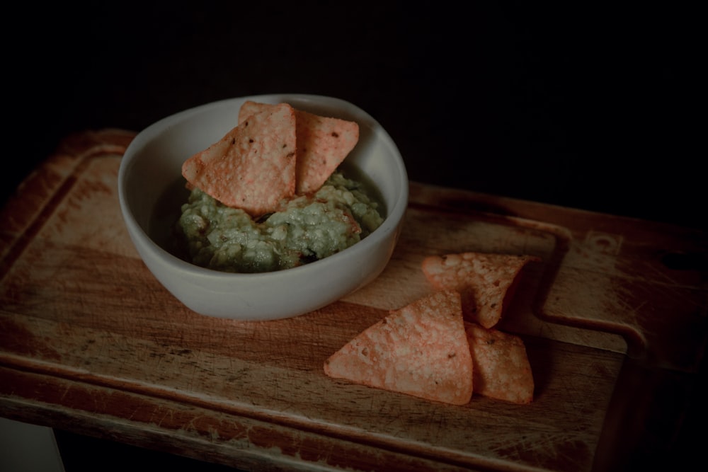 green soup in white ceramic bowl