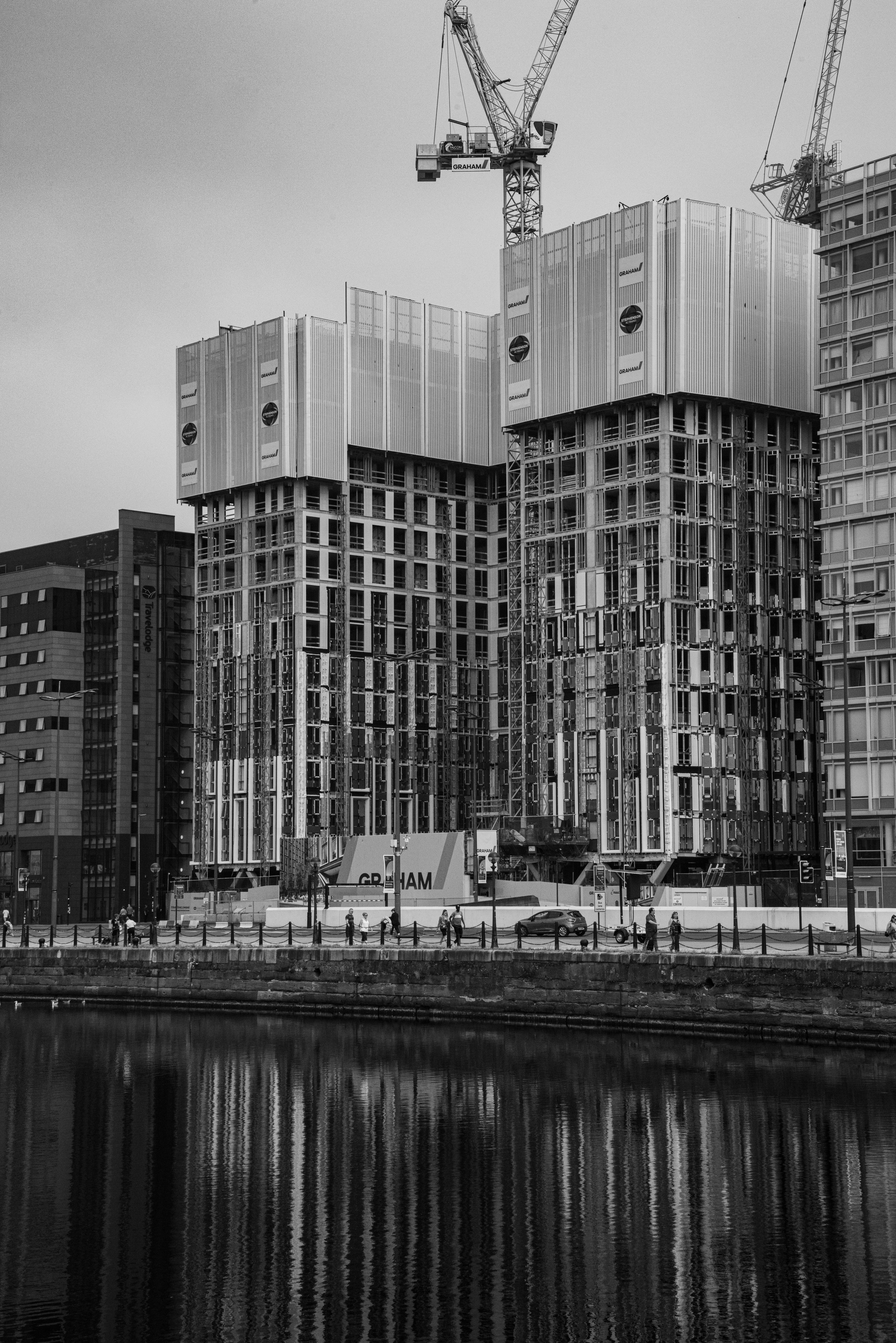 Grayscale photo of high rise building photo – Free Grey Image on Unsplash