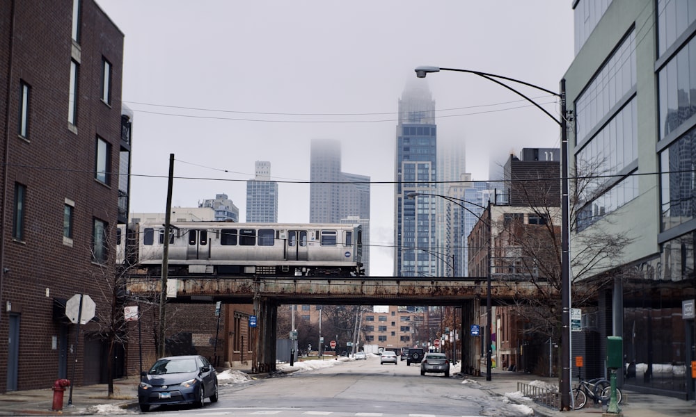 cars on road near buildings during daytime