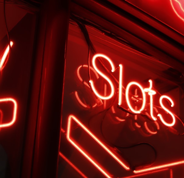 red and white love neon light signage