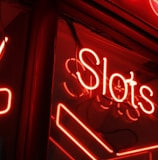 red and white love neon light signage