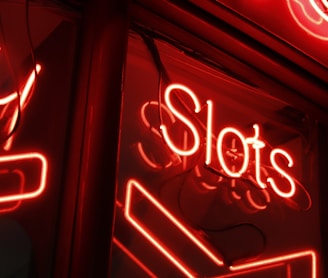 red and white love neon light signage