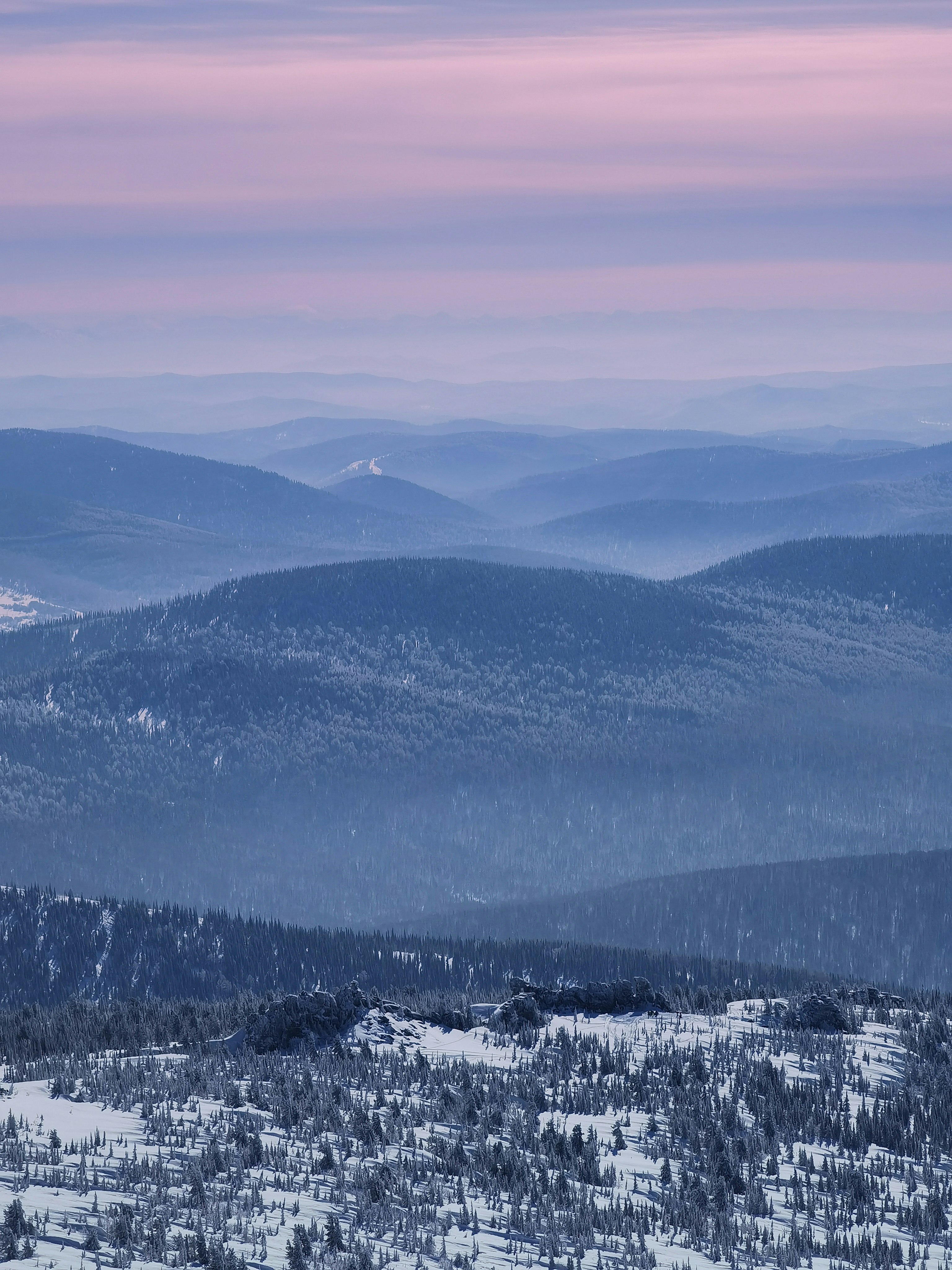 snow covered mountain during daytime