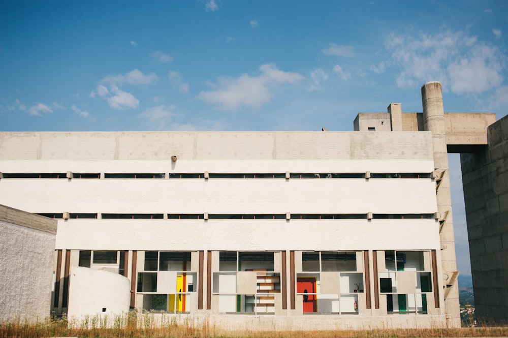 white concrete building under blue sky during daytime