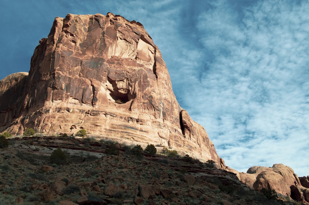 brown rock formation under blue sky during daytime