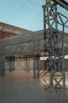 A wider view of the industrial space, enhancing the cinematic and high-tech atmosphere.