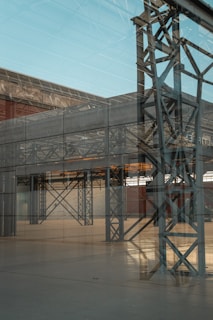 A wider view of the industrial space, enhancing the cinematic and high-tech atmosphere.
