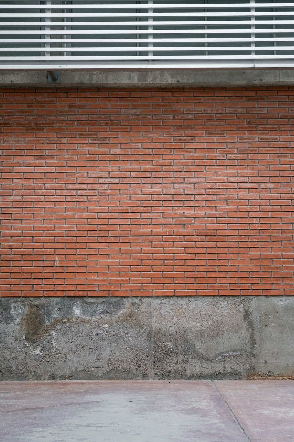 brown brick wall during daytime