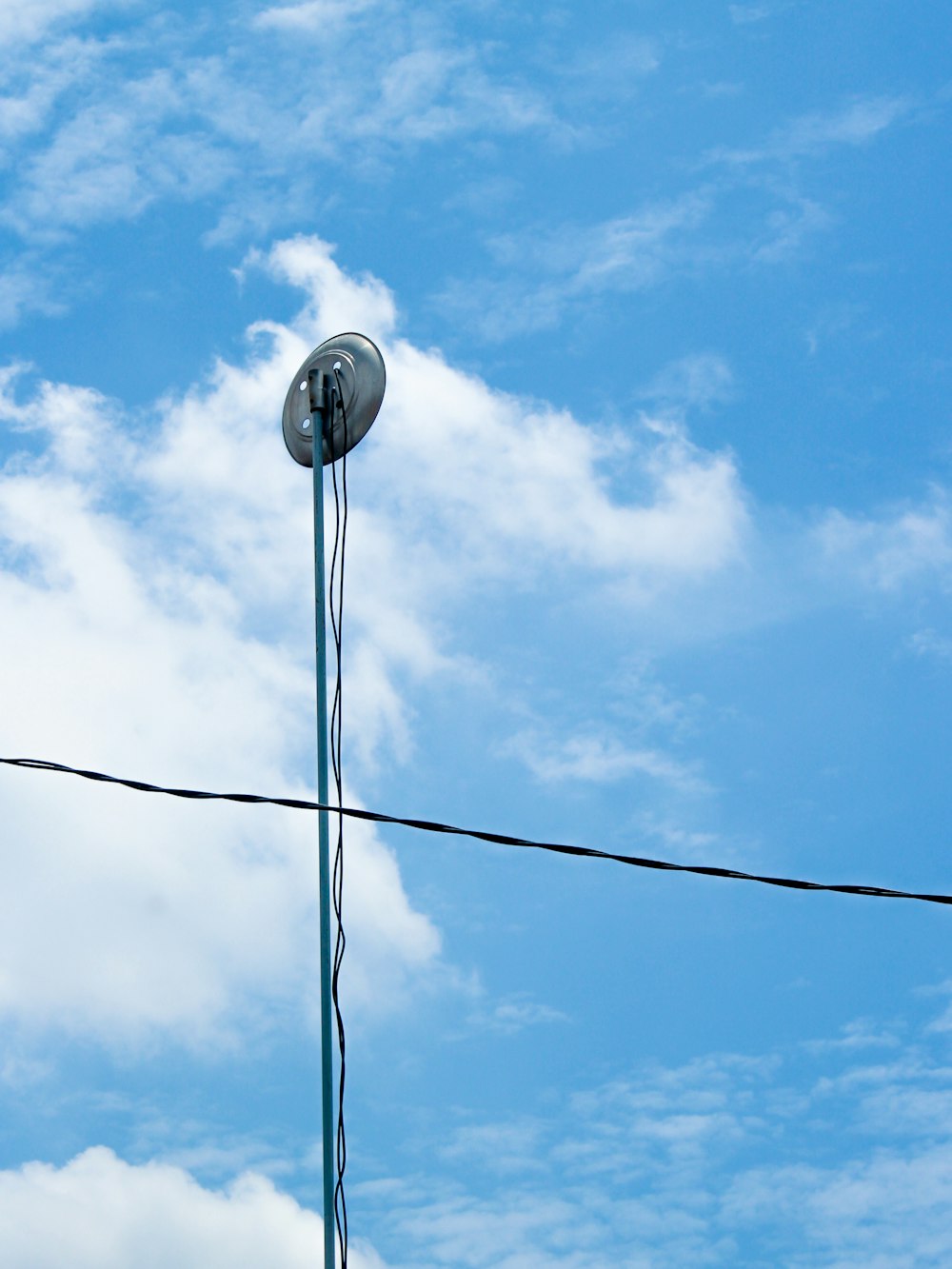 black electric wires under blue sky