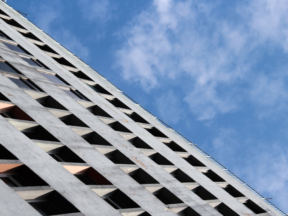 white concrete building under blue sky during daytime