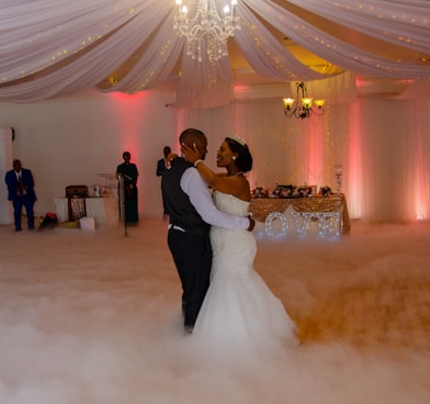 bride and groom dancing on stage