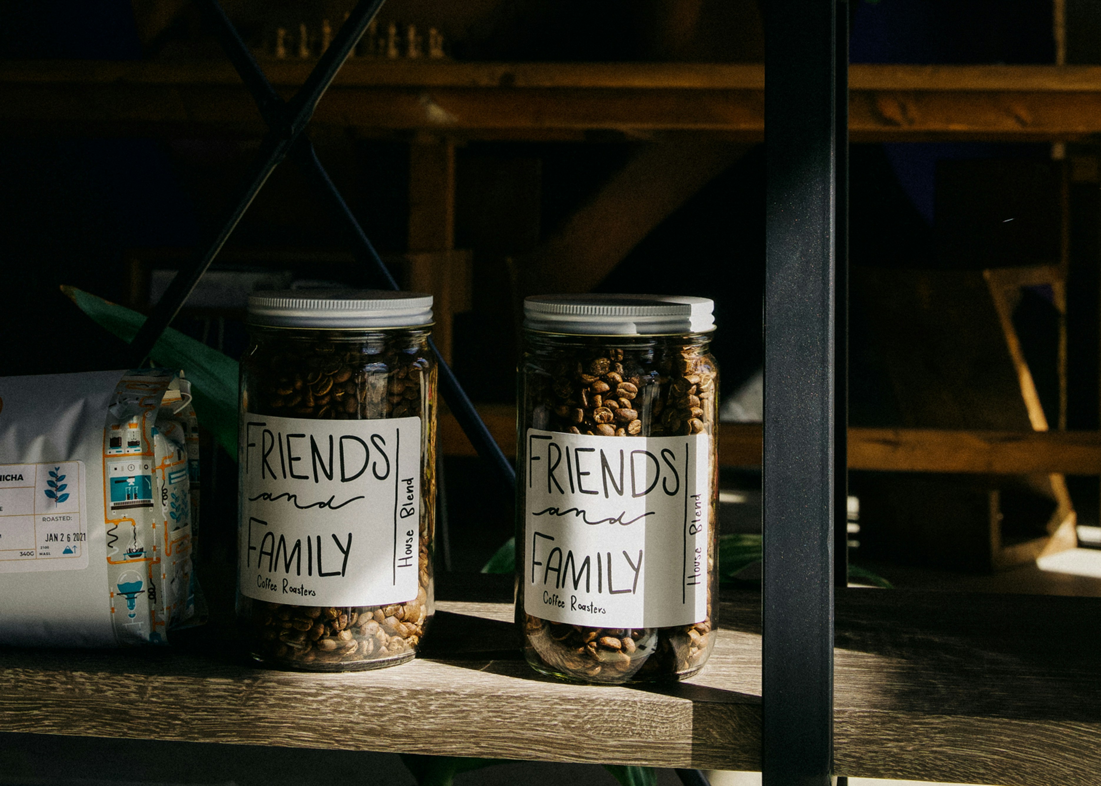 two black and white labeled bottles