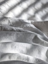 white and gray stripe textile