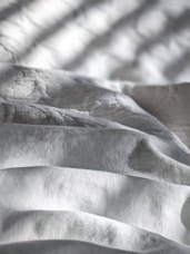 white and gray stripe textile