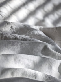 white and gray stripe textile