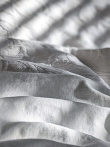 white and gray stripe textile