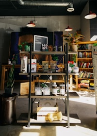 A cozy reading nook with books and merchandise.