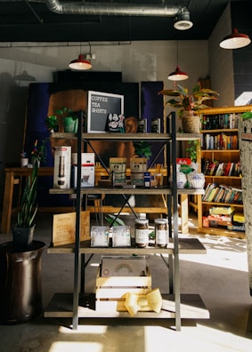A cozy corner with wellness books and relaxation items.