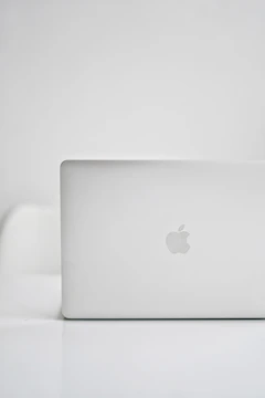 A finished brand presentation displayed on a sleek laptop screen.