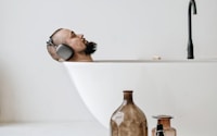 brown glass bottle on white table