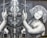 A surreal artwork featuring a figure reminiscent of an alien with large eyes and smooth skin, flanked by an androgynous human figure with curly hair. Both figures appear to be holding crosses, creating a mystical and otherworldly scene.
