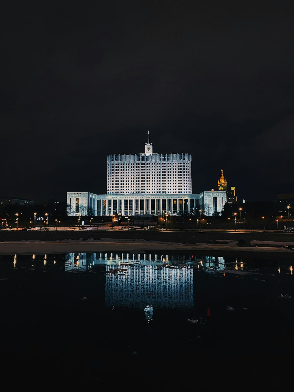 white concrete building during night time