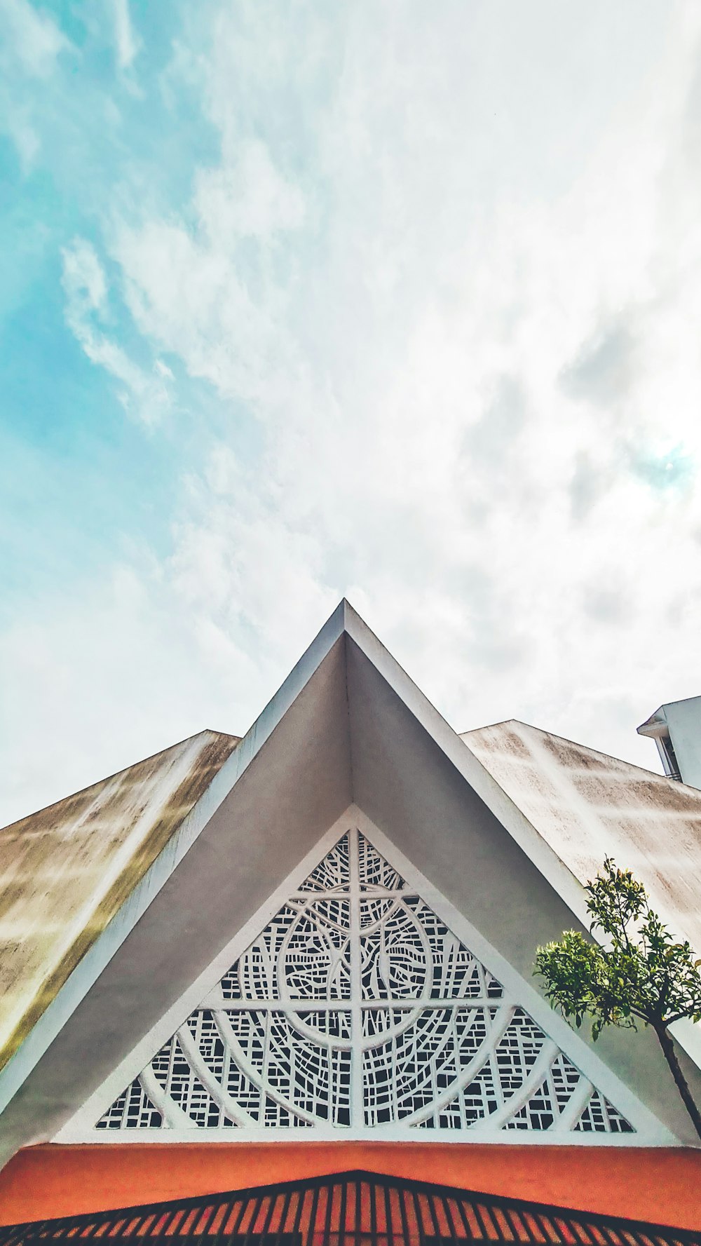 white and gray concrete building under blue sky during daytime