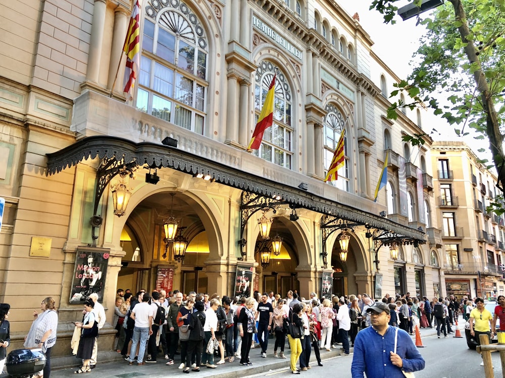 people walking on street near building during daytime