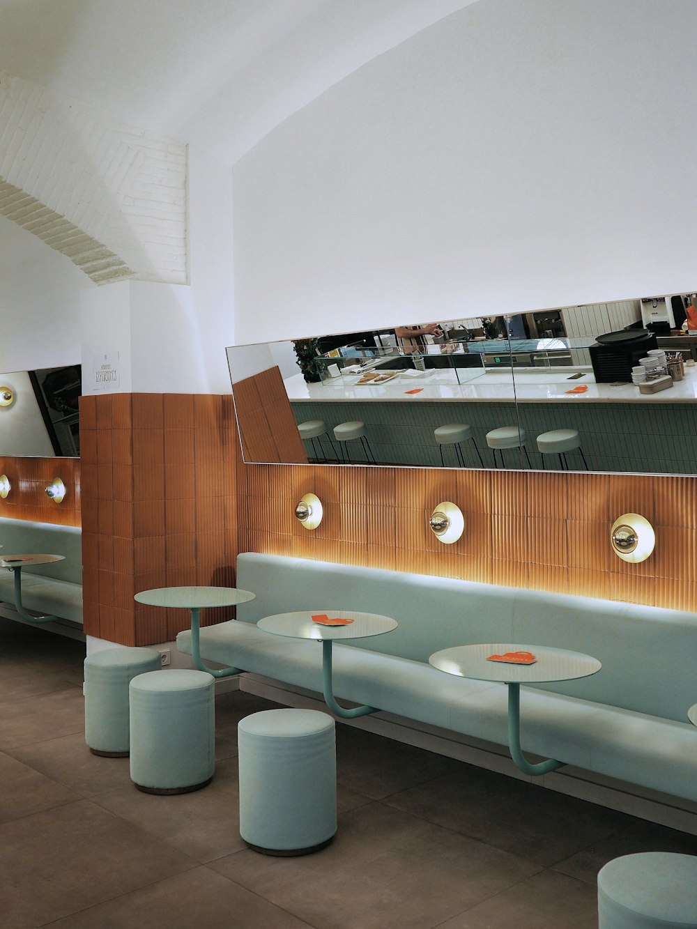 brown wooden cabinet near white round table