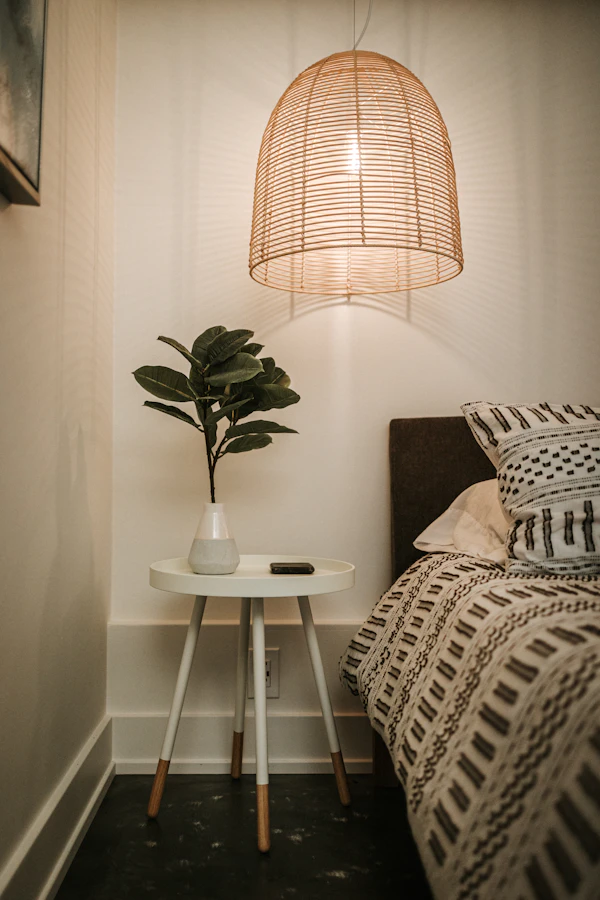Minimalist white table lamp on a round table