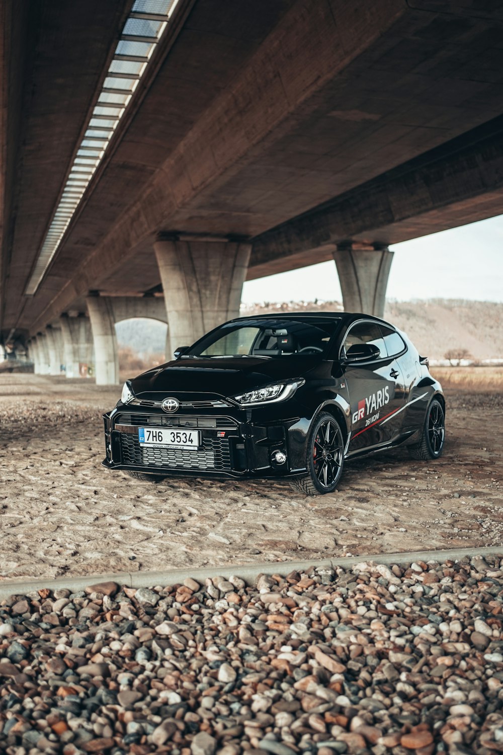 black audi r 8 on brown field during daytime