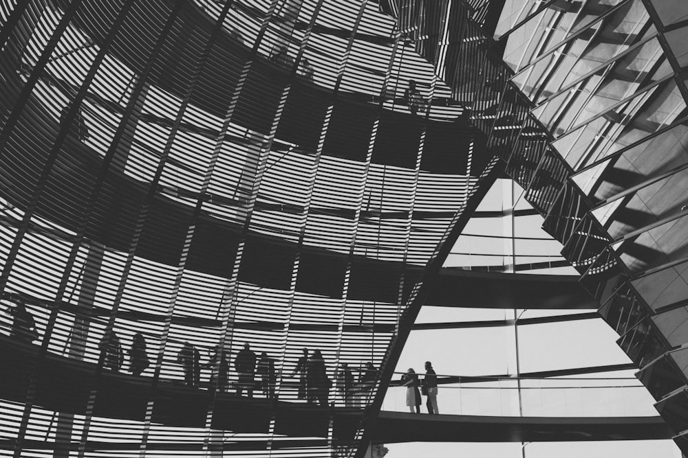 people walking on the stairs inside the building