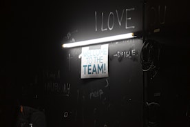 A welcoming team guiding a new employee through onboarding.