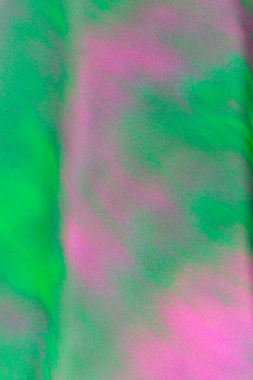 green and purple textile in close up photography