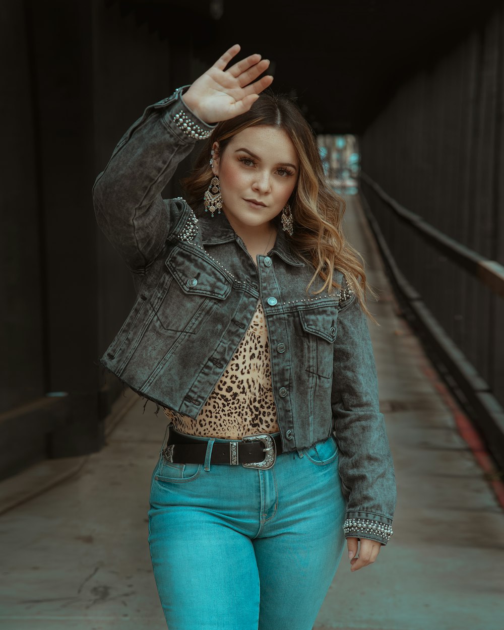 woman in blue denim jacket and blue denim jeans