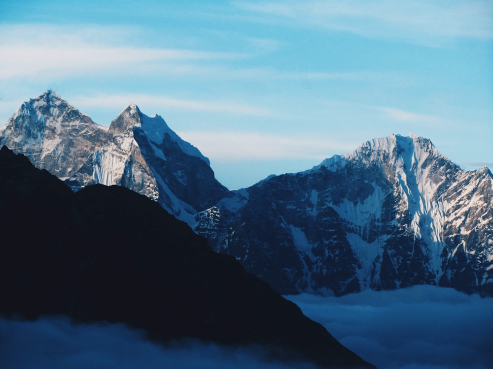 snow covered mountain during daytime