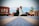 man and woman sitting on brown wooden floor during daytime
