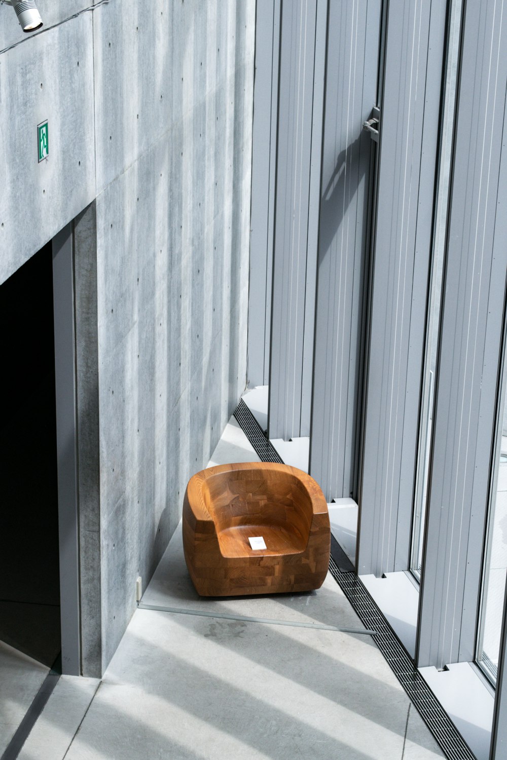 brown and black pet bed on gray concrete floor