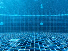 blue swimming pool with water