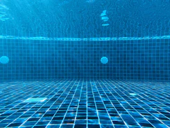 blue swimming pool with water