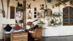 Decorative 3D printed nautical-themed wall art displayed in a cozy room with sea tones