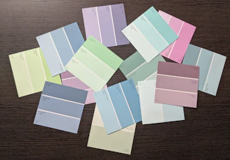 A mood board featuring midnight blue, vibrant pink, lavender, and cream color swatches.