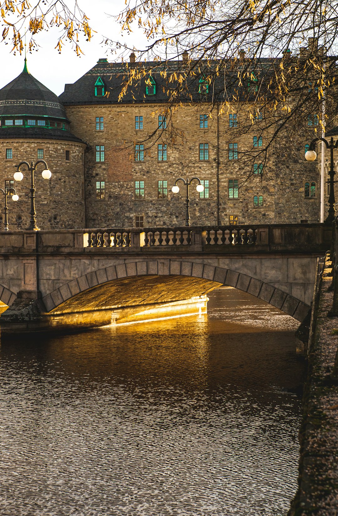 gray concrete bridge over river