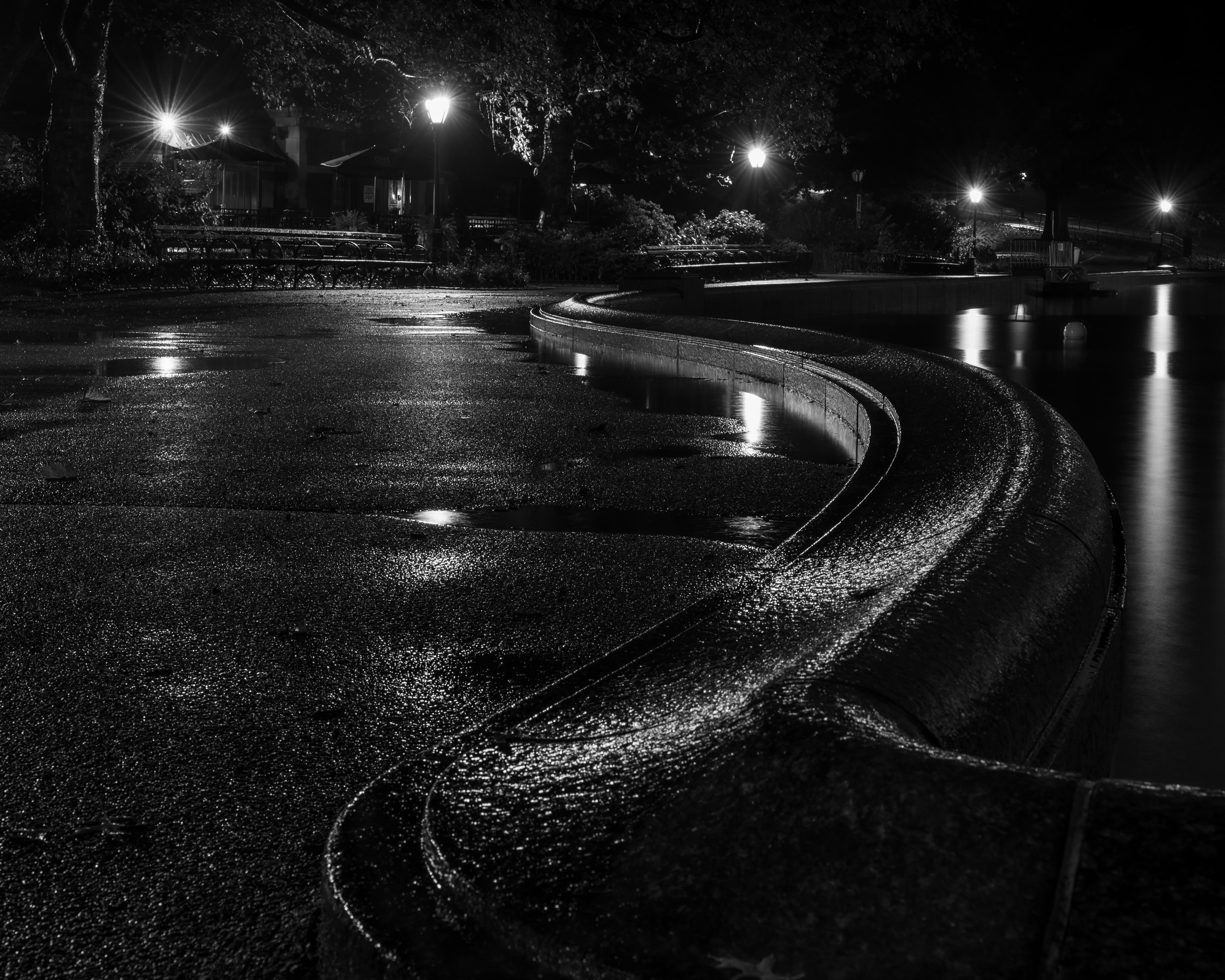grayscale photo of road during night time