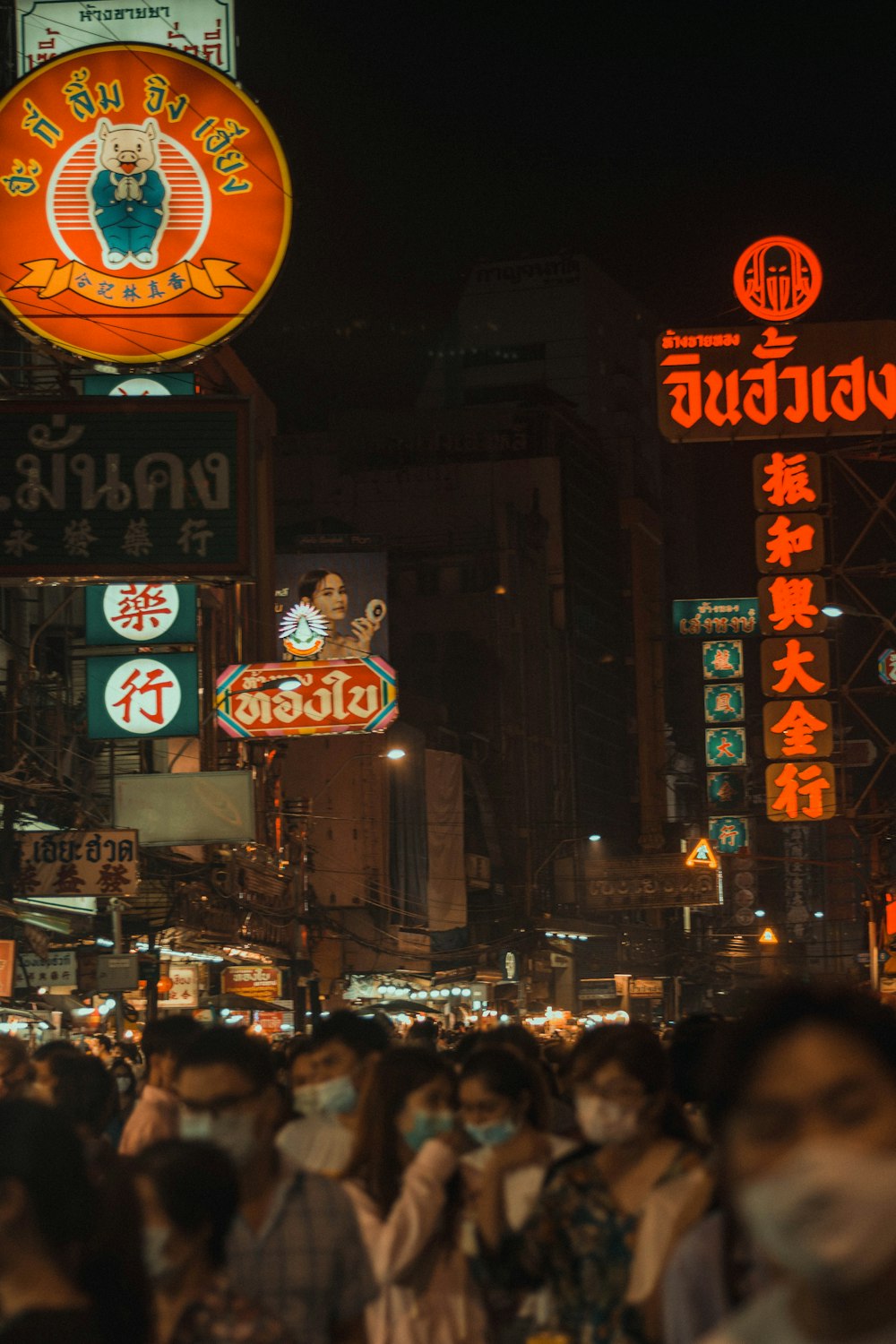 people walking on street during night time